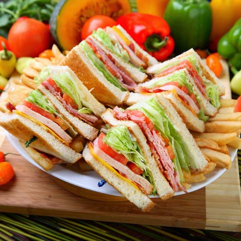 Triple decker piled high with crispy bacon, turkey, lettuce, tomato, American and Mozzarella cheese and mayo.