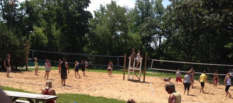 Group of people playing beach volleyball